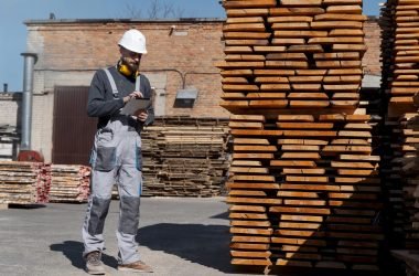 man-working-mdf-boards-warehouse